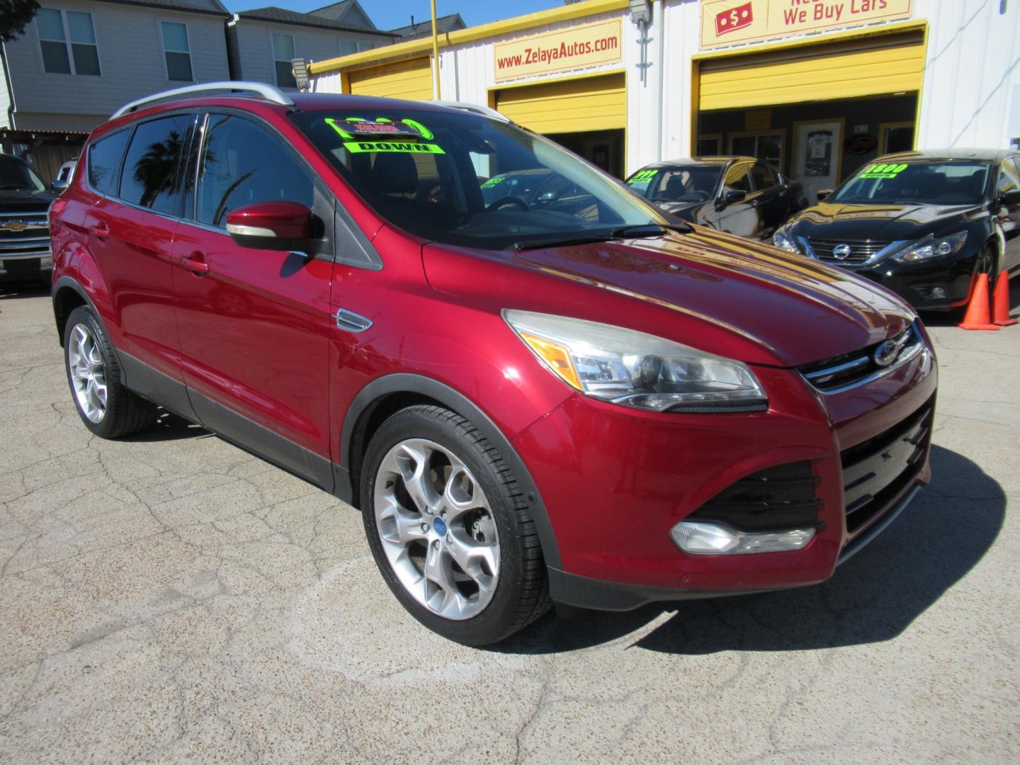 2014 Red /Black Ford Escape Titanium (1FMCU0J98EU) with an 2.0 engine, Automatic transmission, located at 1511 North Shepherd Dr., Houston, TX, 77008, (281) 657-1221, 29.798361, -95.412560 - 2014 FORD ESCAPE TITANIUM VIN: 1FMCU0J98EUA29272 1 F M C U 0 J 9 8 E U A 2 9 2 7 2 4 DOOR WAGON/SPORT UTILITY 2.0L I4 F DOHC 16V GASOLINE FRONT WHEEL DRIVE - Photo#20